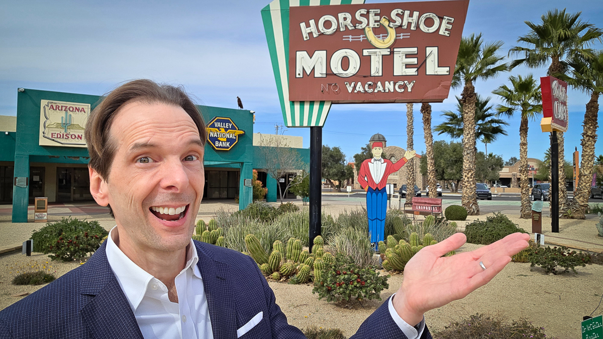 Motivational speaker Larry Weaver having fun at Casa Grande Neon Sign Park in Casa Grande, Arizona