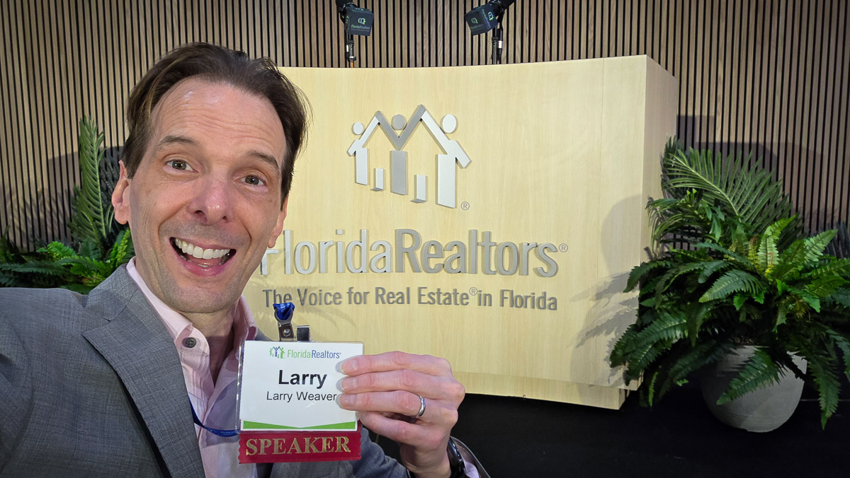 Larry Weaver in front of a Florida Realtors stage after speaking at the Convention & Trade Expo at Rosen Shingle Creek in Orlando.