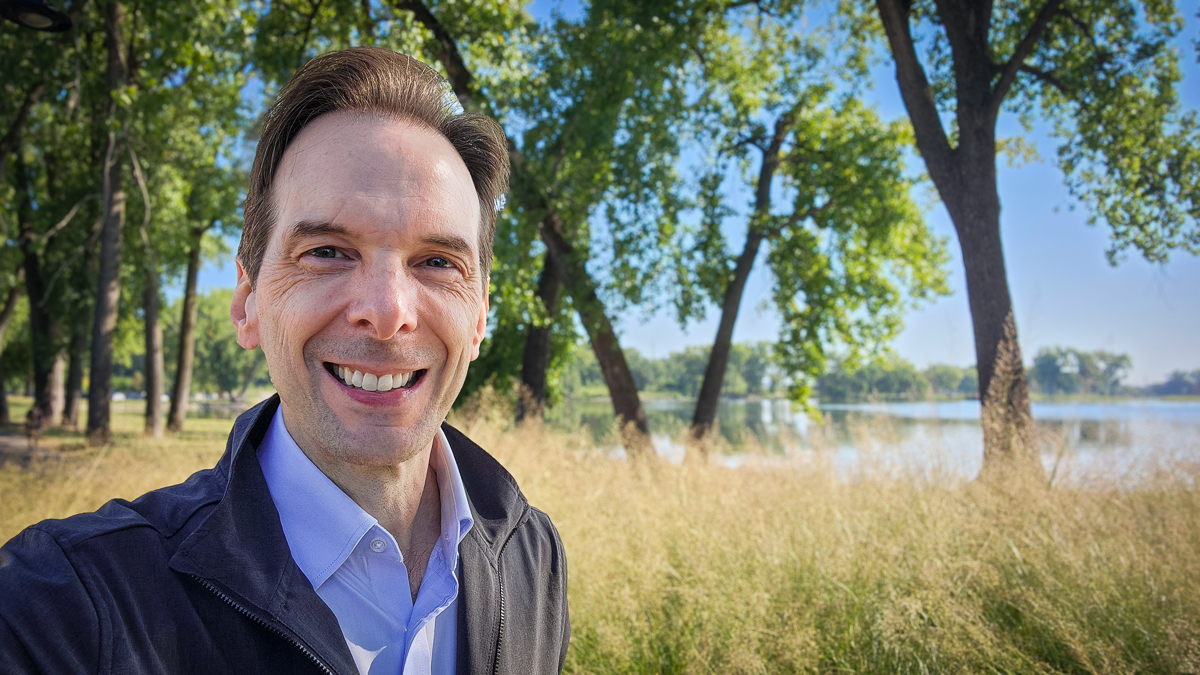 Motivational speaker Larry Weaver walking near Gray’s Lake in Des Moines, Iowa