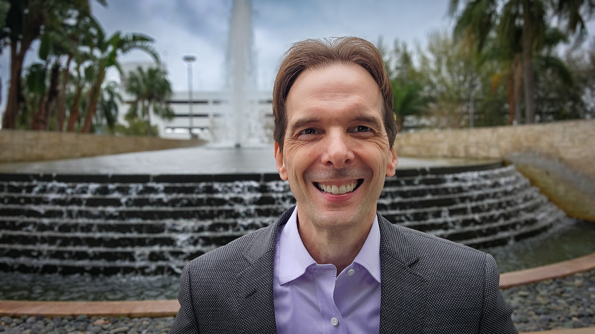Motivational speaker Larry Weaver beside the fountain at Hilton Orlando in Orlando, Florida