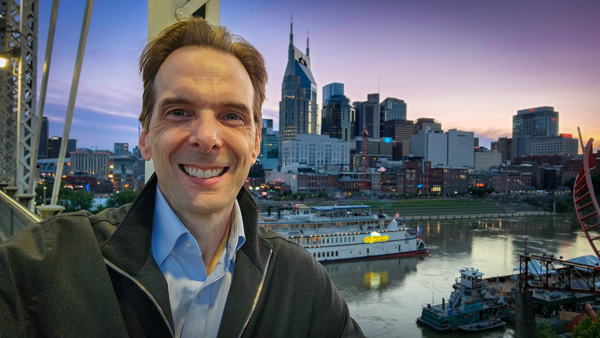Motivational speaker Larry Weaver on the John Seigenthaler Pedestrian Bridge overlooking the Cumberland River in Nashville, Tennessee