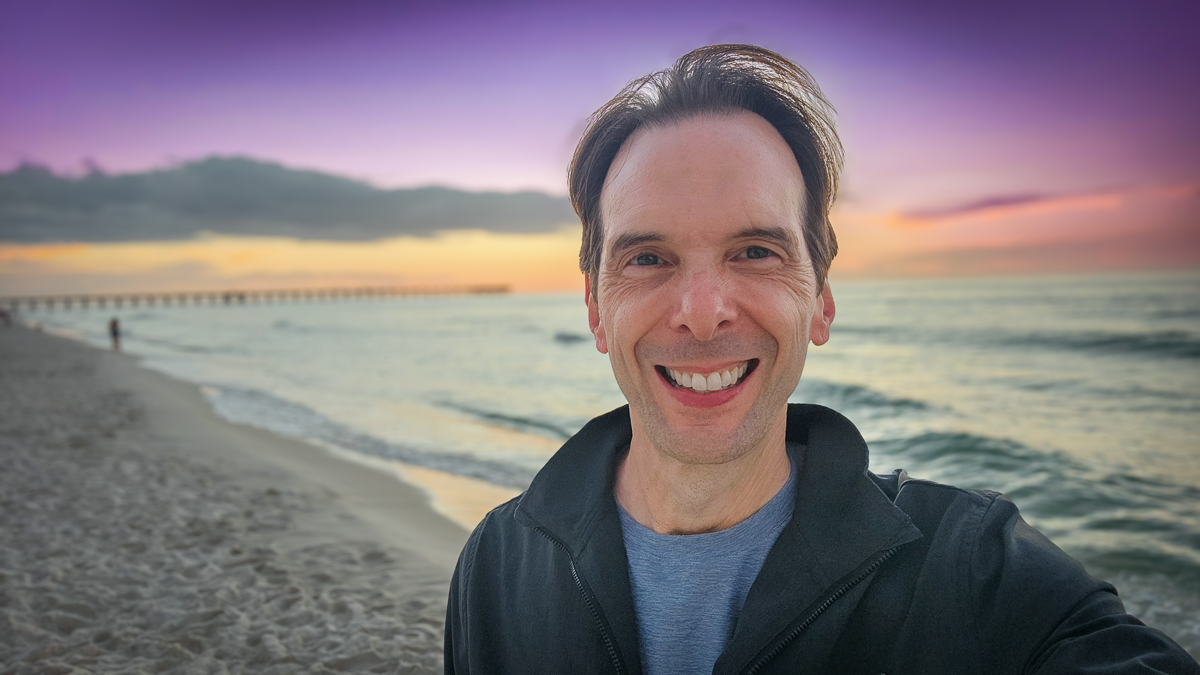 Motivational speaker Larry Weaver on the beach at sunset in Panama City Beach, Florida