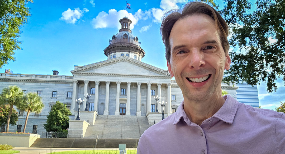 Larry Weaver in front of the South Carolina State House in Columbia while in town for a human services organization event.