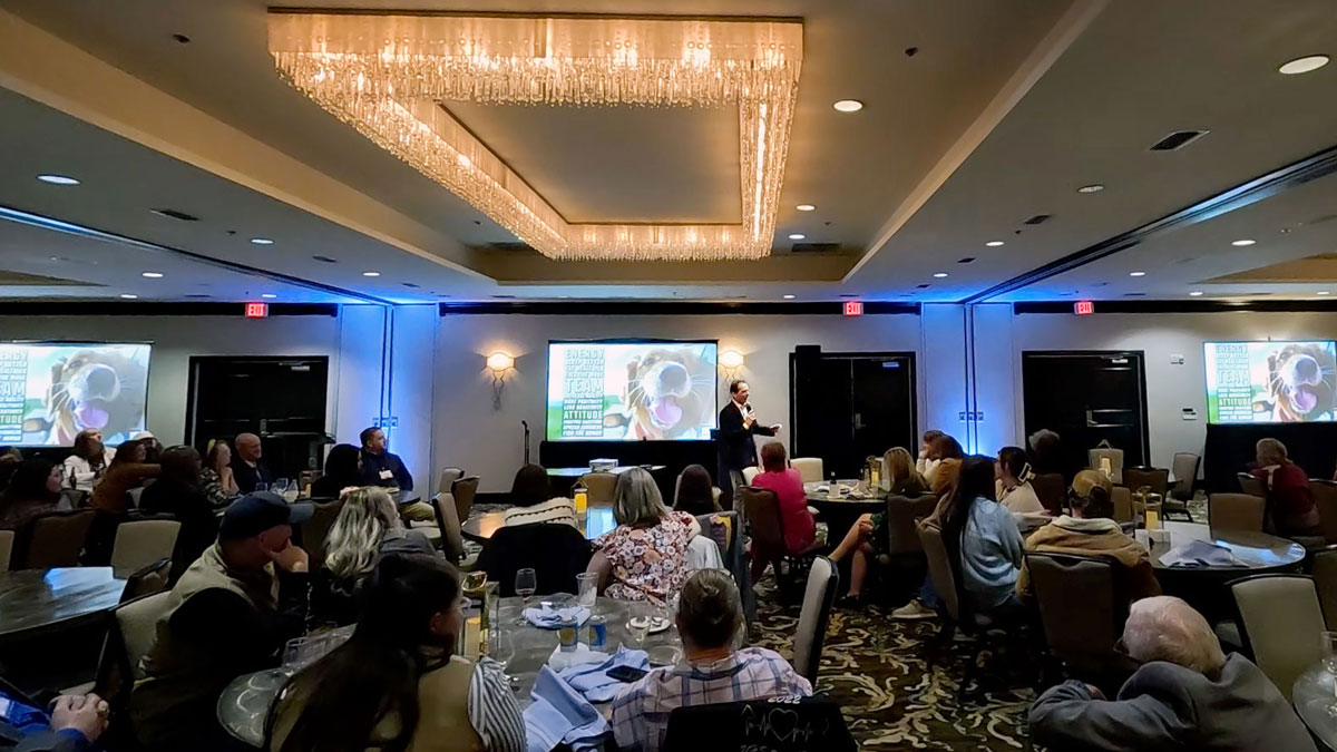 Motivational keynote speaker Larry Weaver presenting to agriculture educators and industry leaders at One Ocean Resort in Atlantic Beach near Jacksonville, Florida