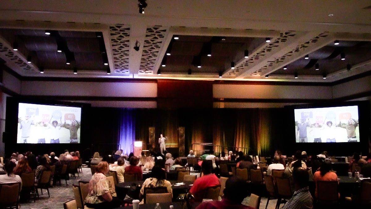 Larry Weaver speaking onstage for employment first professionals during a conference at Renaissance Montgomery Hotel & Spa in Montgomery, Alabama.