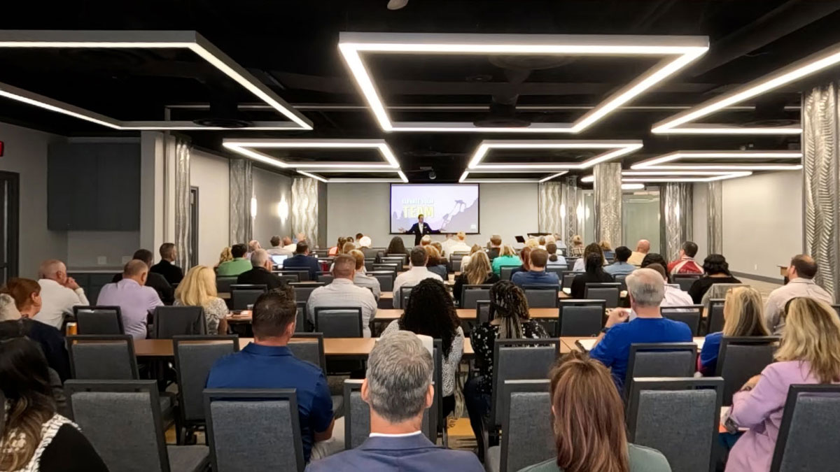 Motivational keynote speaker Larry Weaver presenting to healthcare supply chain professionals at Perdido Beach Resort in Orange Beach, Alabama