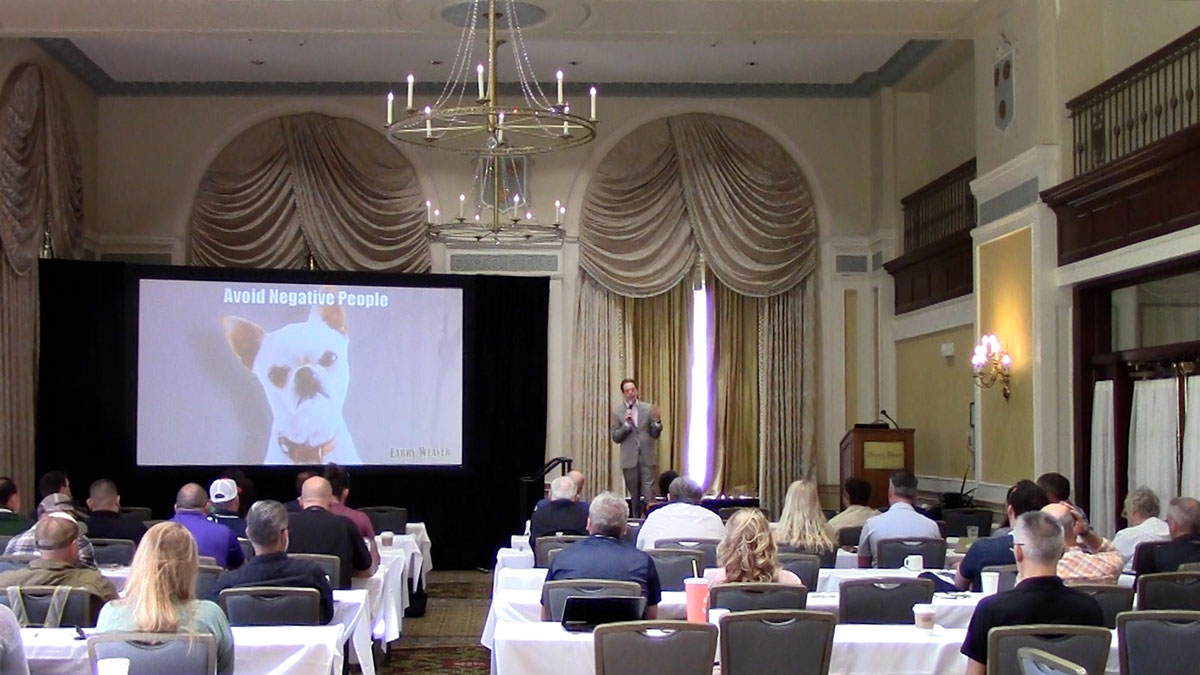 Motivational keynote speaker Larry Weaver presenting to landscaping professionals at the Francis Marion Hotel in Charleston, South Carolina