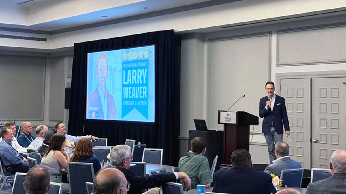 Motivational keynote speaker Larry Weaver presenting to grain and feed industry professionals at Hilton Dallas/Rockwall Lakefront in the Dallas area