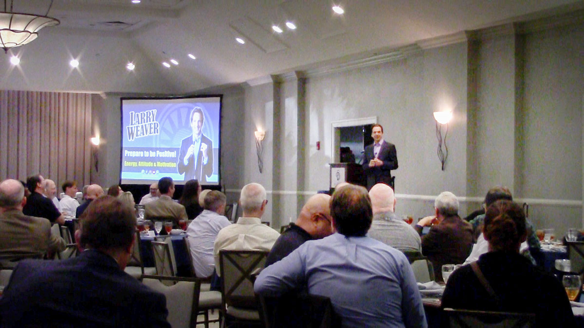 Larry Weaver speaking onstage for residential mortgage regulators during a regulatory conference at The DeSoto Savannah in Savannah, Georgia.