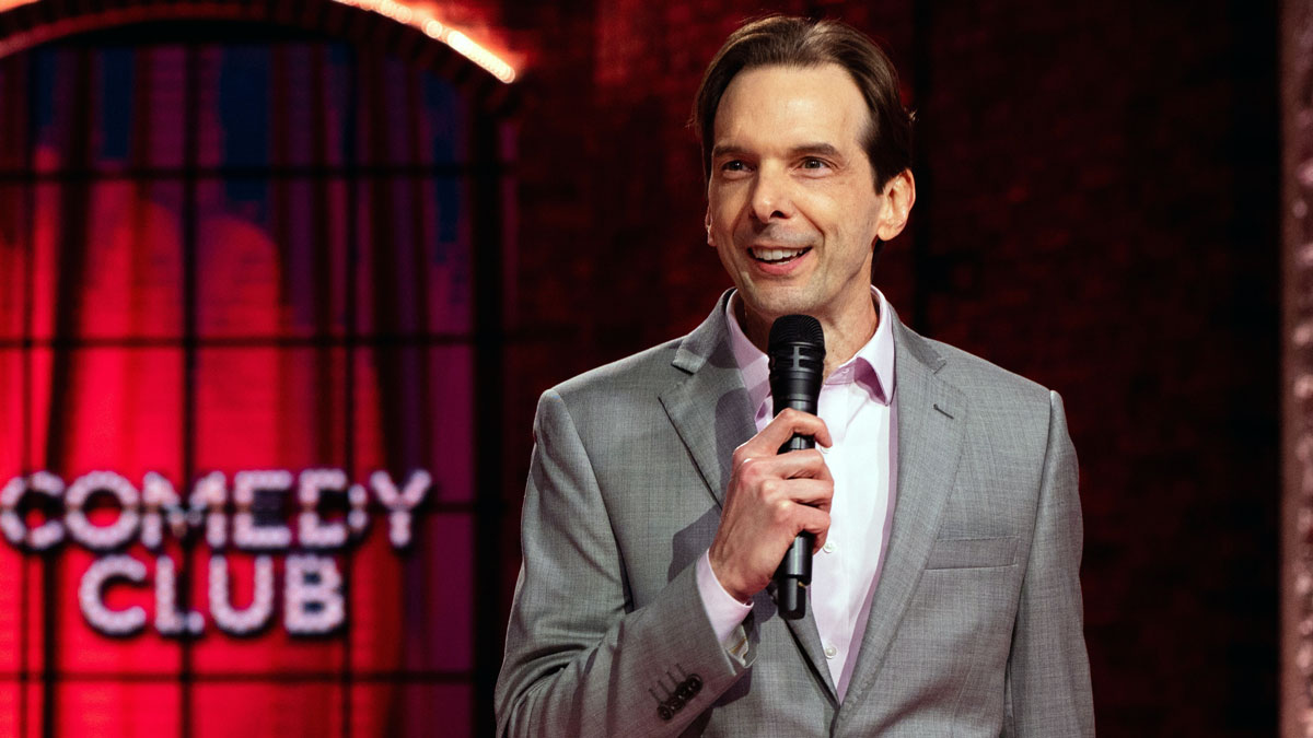 Larry Weaver performing a clean comedy set during a national television appearance at Trinity Music Village in Nashville, Tennessee.