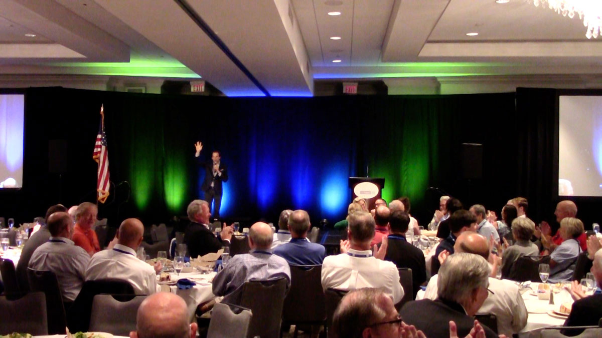 Larry Weaver speaking onstage for public power professionals during an annual conference at Lexington Griffin Gate Marriott Golf Resort & Spa in Lexington, Kentucky.