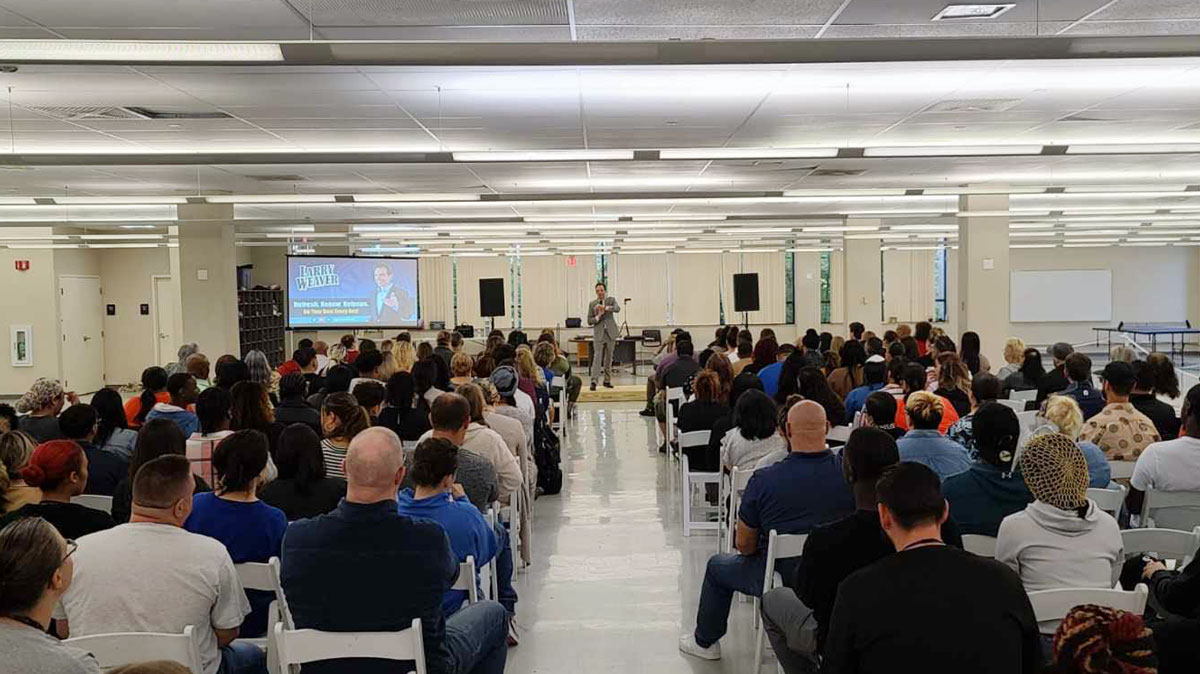 Motivational keynote speaker Larry Weaver presenting to teachers, interventionists, and school administrators in Springfield, Massachusetts